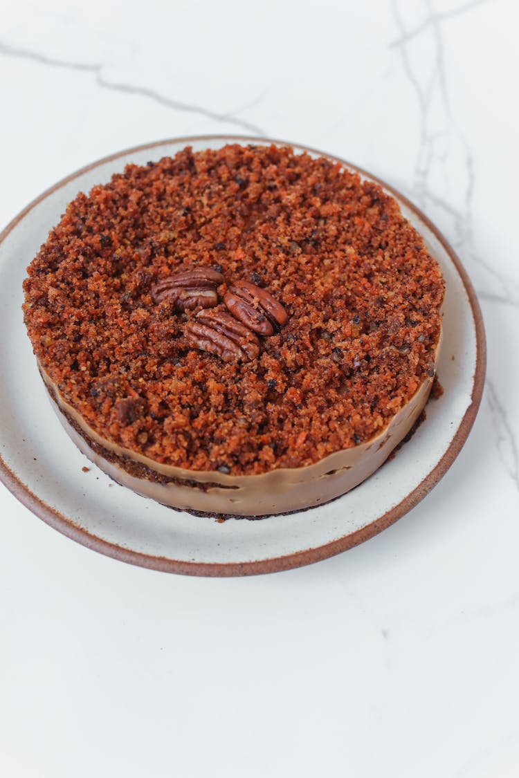 Pecan Cake On White Ceramic Plate