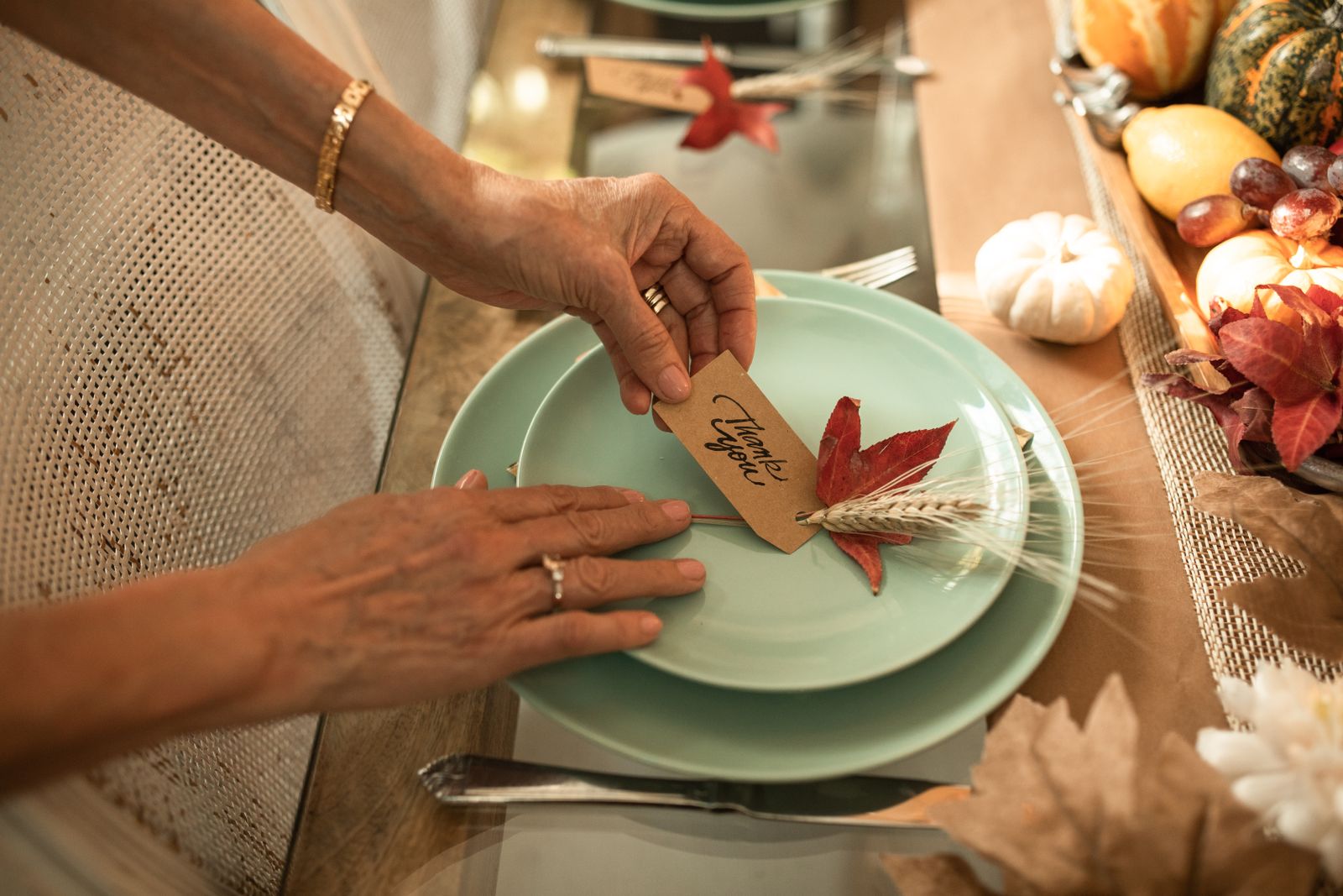 autumn table setting with a Thank You card and festive decorations, landscape
