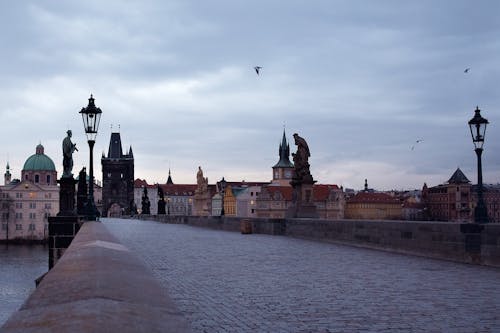 Photo of Charles Bridge in Prague under Gray Clouds