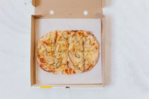 Top View of Pizza on Brown Box