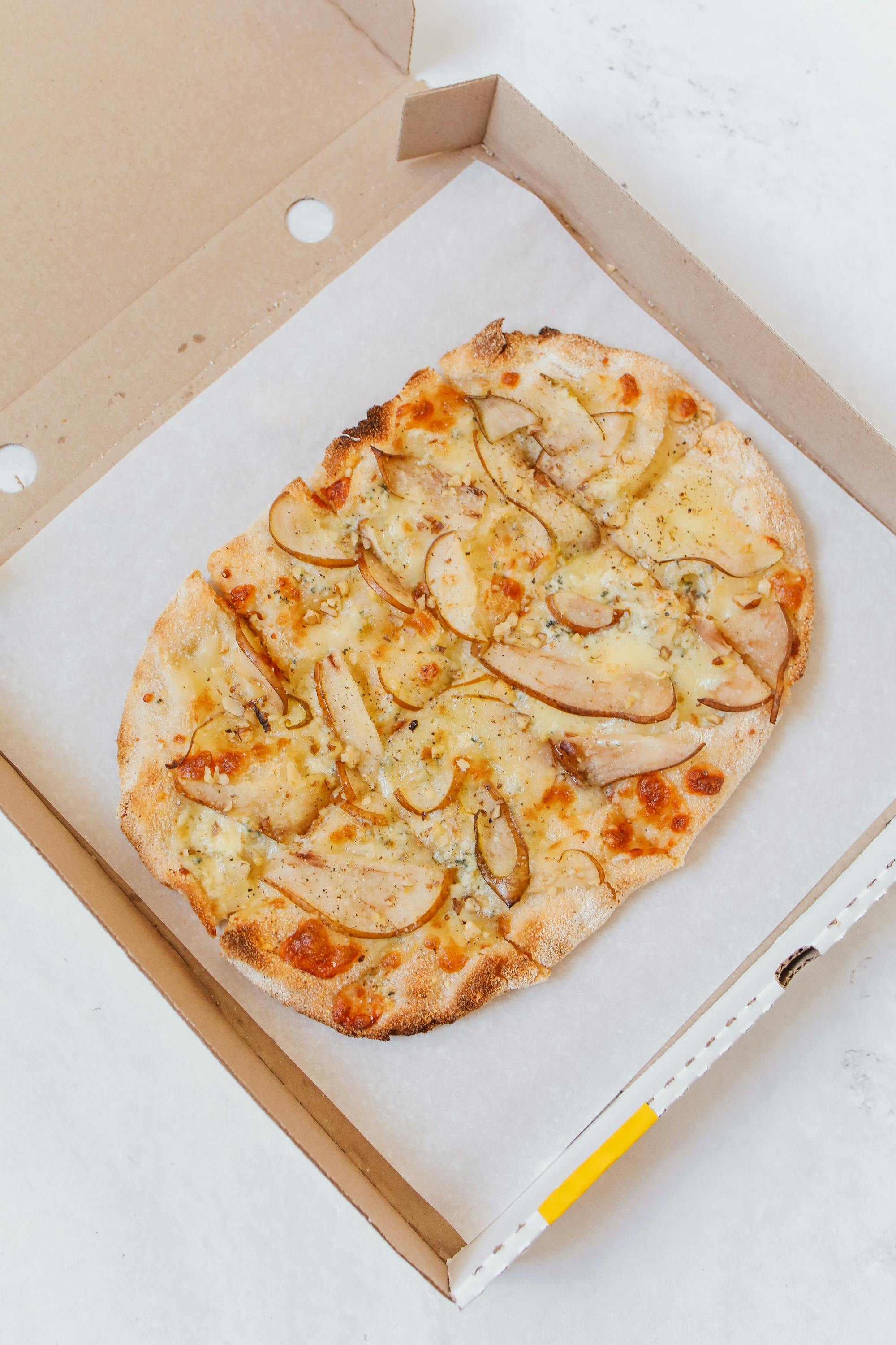 Italian Pizza on Brown Box · Free Stock Photo