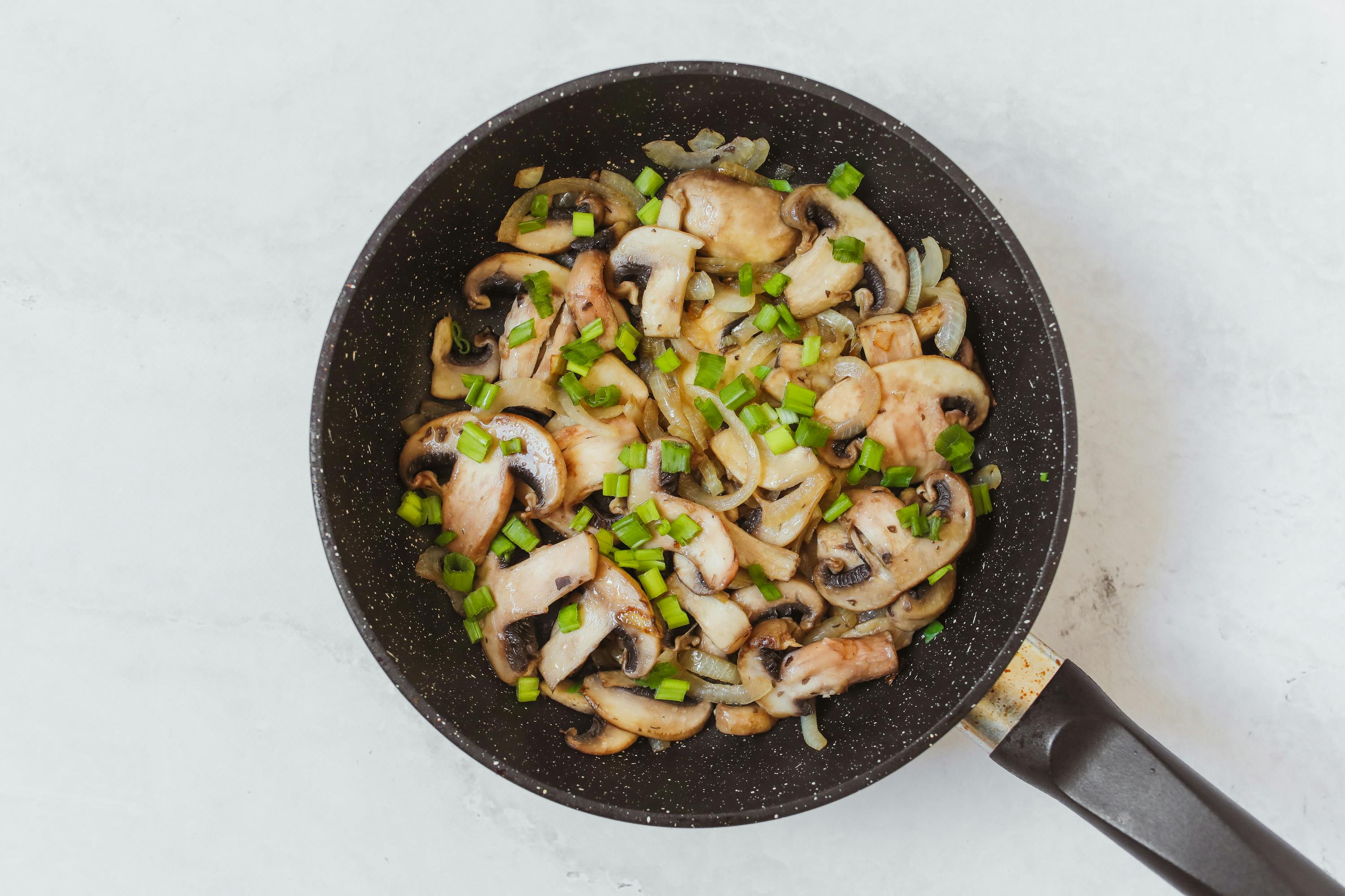mushrooms in a frying pan