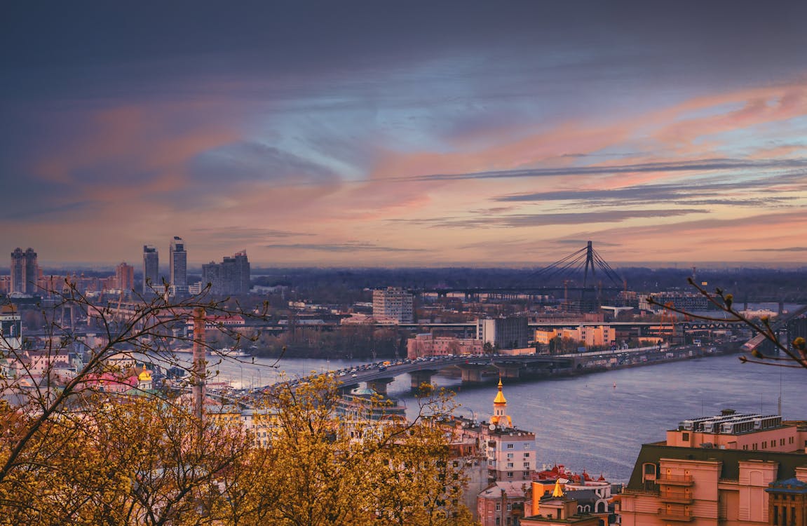 A Bridge and City Skyline at Sunset