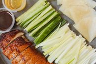 Sliced Green Vegetable Beside Fried Duck