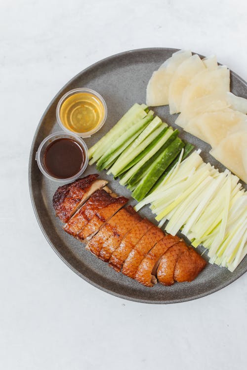 Savory Peking Duck Dish on an Earthenware 