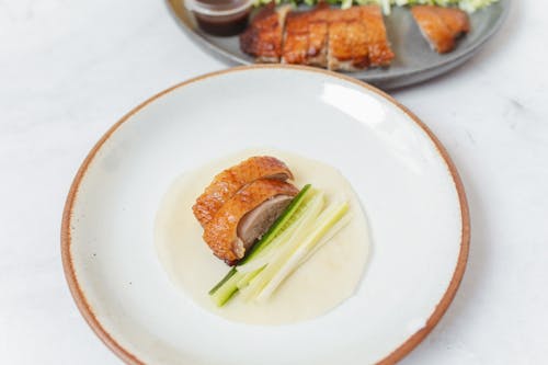 Sliced Meat on White Ceramic Plate