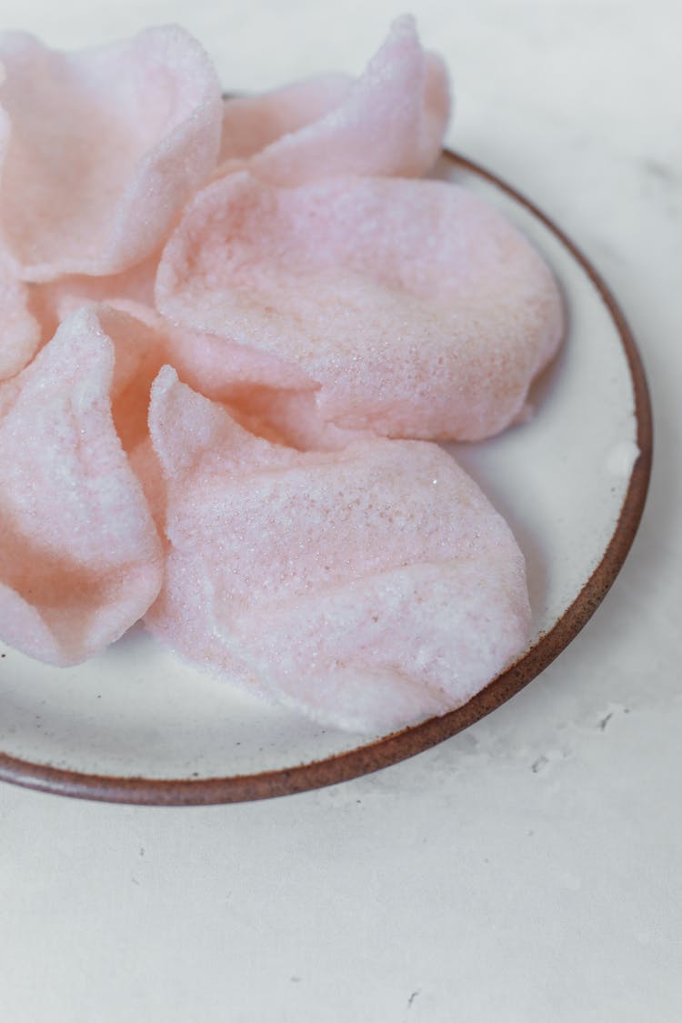 Close-up Photo Of Prawn Cracker On A Ceramic Plate 