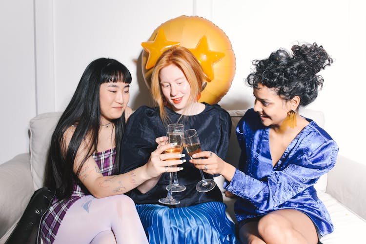 Group Of Women Drinking Champagne