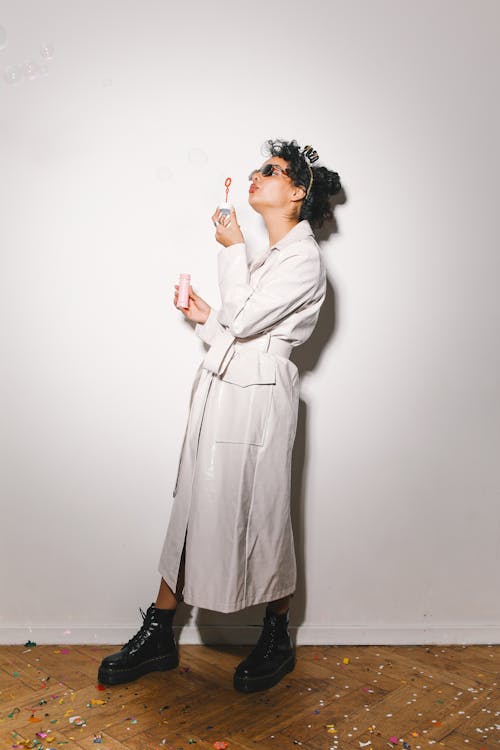 A Woman in White Trench Coat