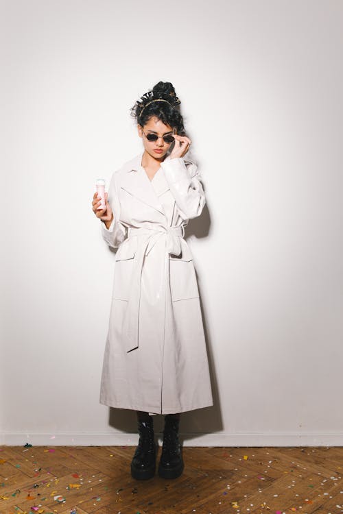 A Woman in White Trench Coat