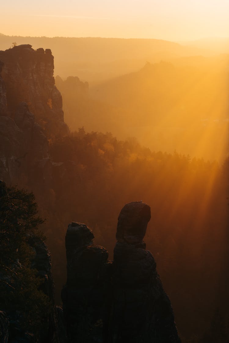 Silhouette Of Mountain During Sunrise