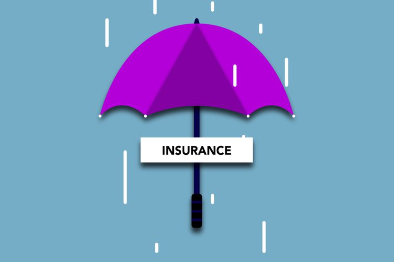 Decorative cardboard illustration of signboard with Insurance title under umbrella in rain on blue background