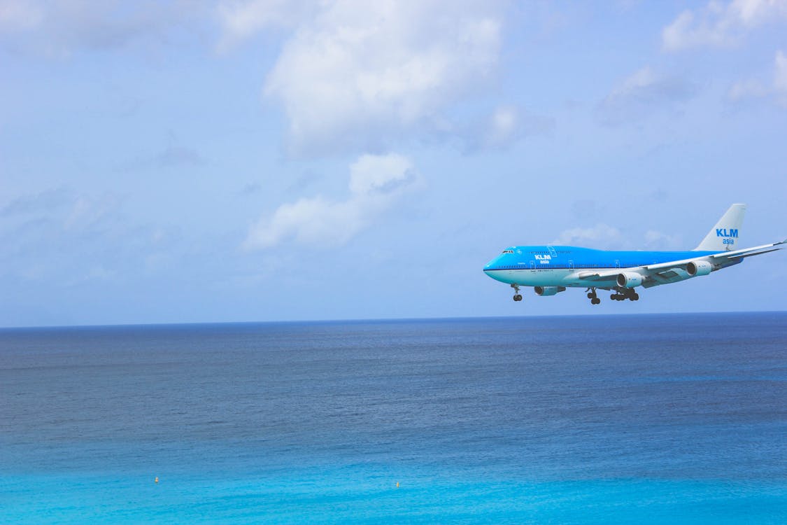 Free White and Blue Passenger Plane Stock Photo