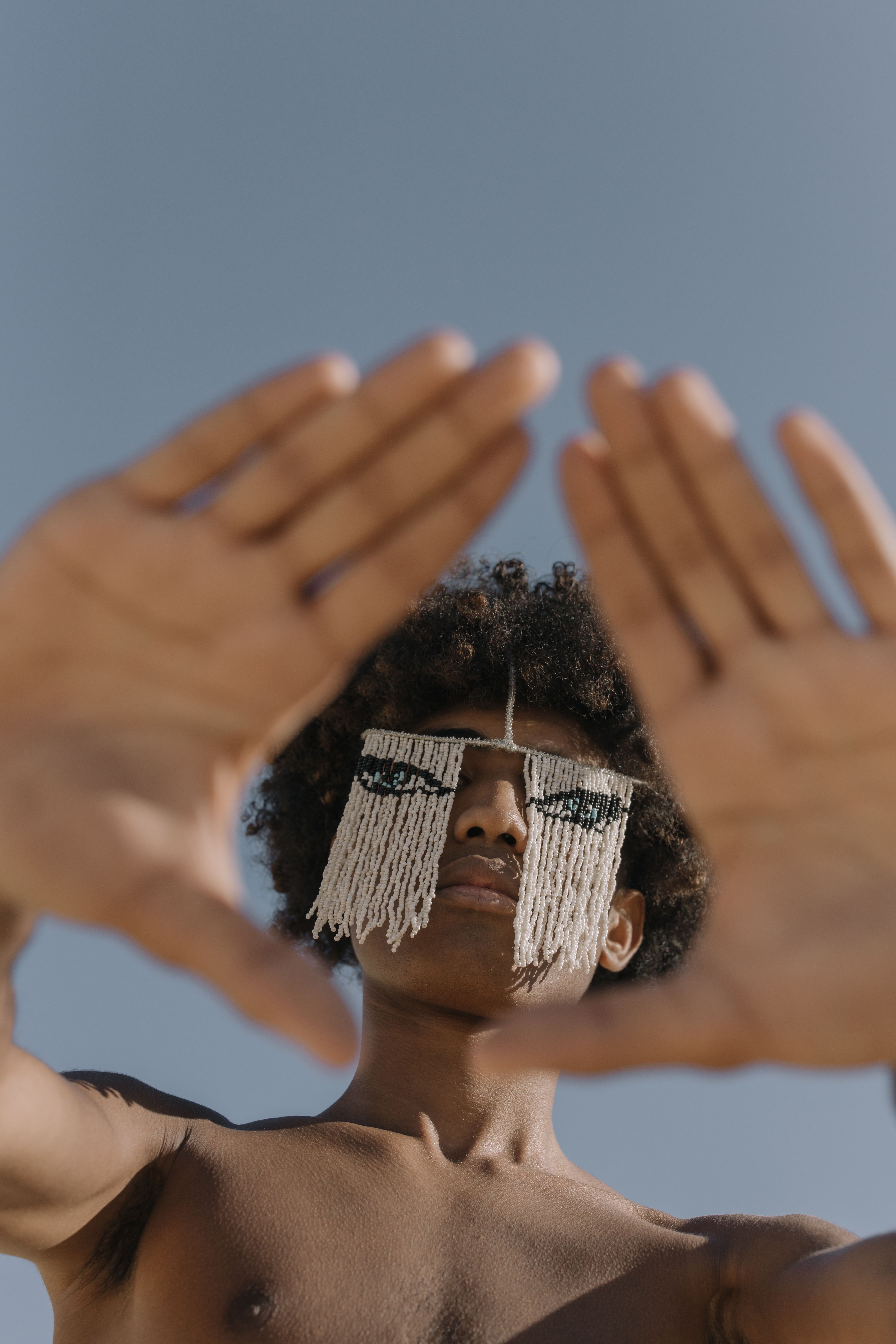 Low Angle Shot of Man with White Threads covering his Eyes · Free Stock ...