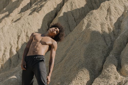 Foto profissional grátis de abs, afro-americano, areia