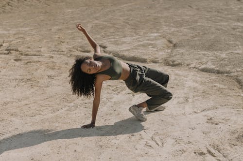 Woman Dancing on the Ground