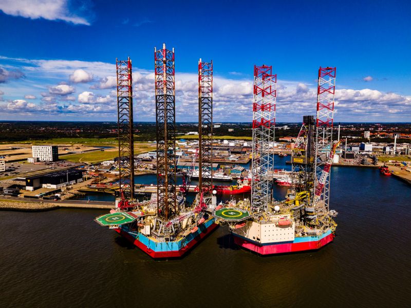 Aerial panorama of oil rigs at port