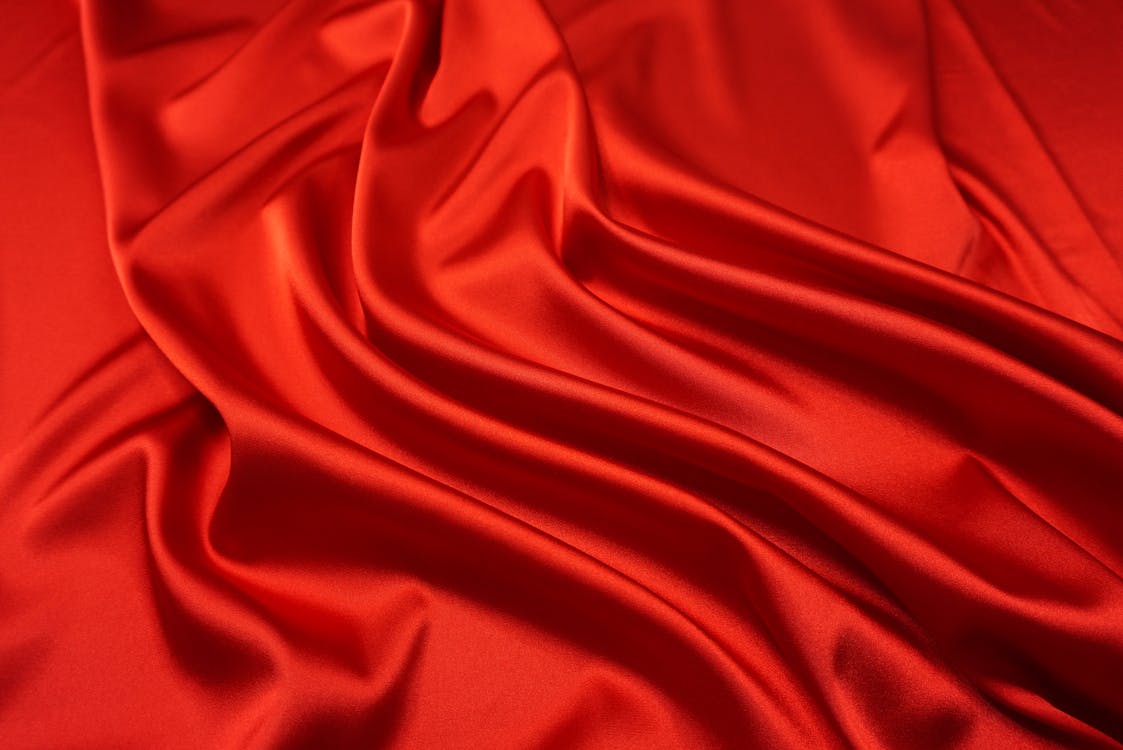 Ripples on a Red Silk Fabric · Free Stock Photo
