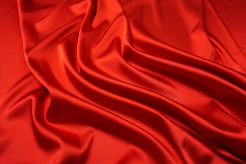 Free Ripples on a Red Silk Fabric Stock Photo