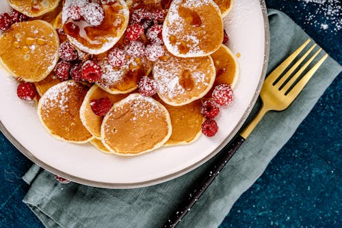 Free A Close-Up Shot of Pancakes with Fresh Raspberries Stock Photo