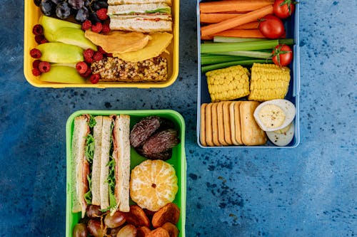 Free Healthy Lunch Boxes on the Blue Surface
 Stock Photo