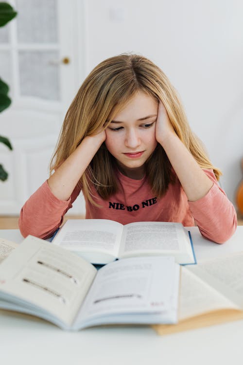 Free Girl Reading A Book Stock Photo
