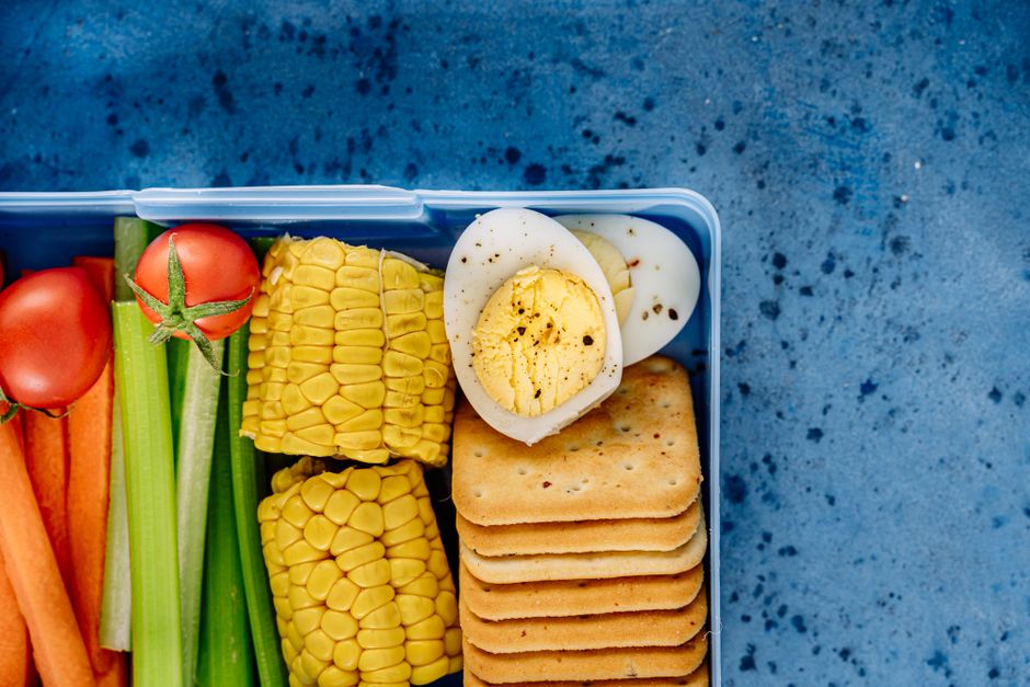 A colorful bento box with sections for cheese, crackers, grapes, and carrot sticks - good lunch ideas for picky eaters A colorful bento box with sections for cheese, crackers, grapes, and carrot sticks - good lunch ideas for picky eaters