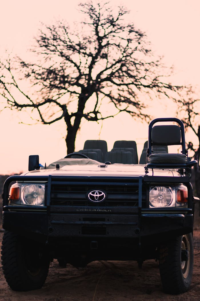 Front view of a Toyota Land Cruiser safari vehicle ready for a game drive