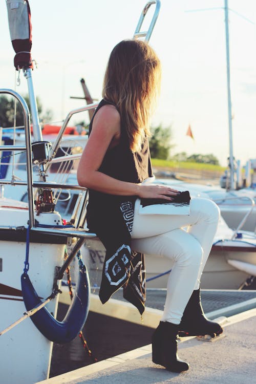 Girl sitting on the boat