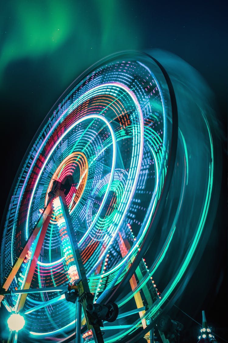 Long Exposure Shot Of A Spinning Ferris Wheel