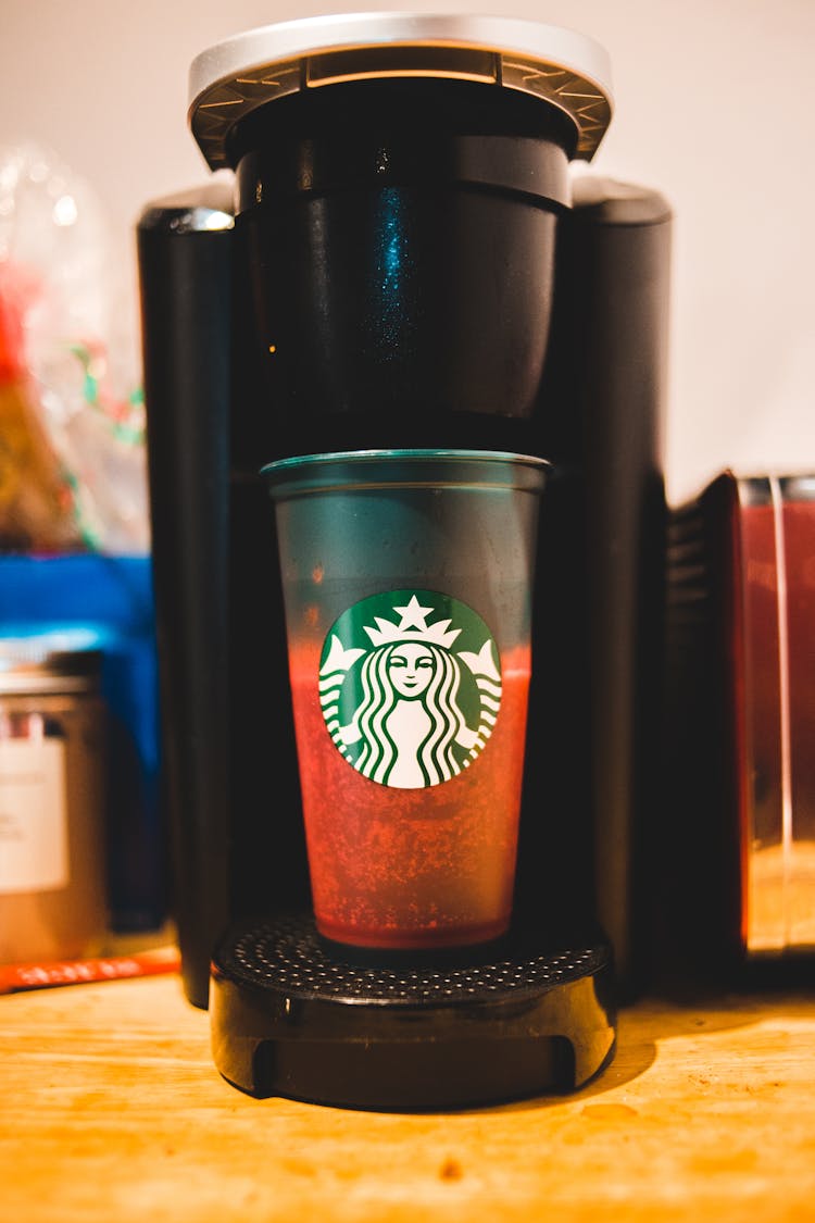 Cup Filling With Coffee From Machine