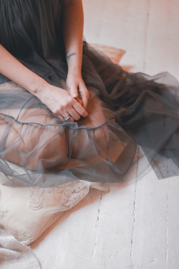 Woman In Gray Sheer Dress