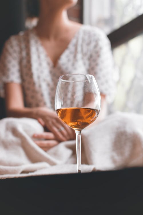 A Woman with a Glass of Wine