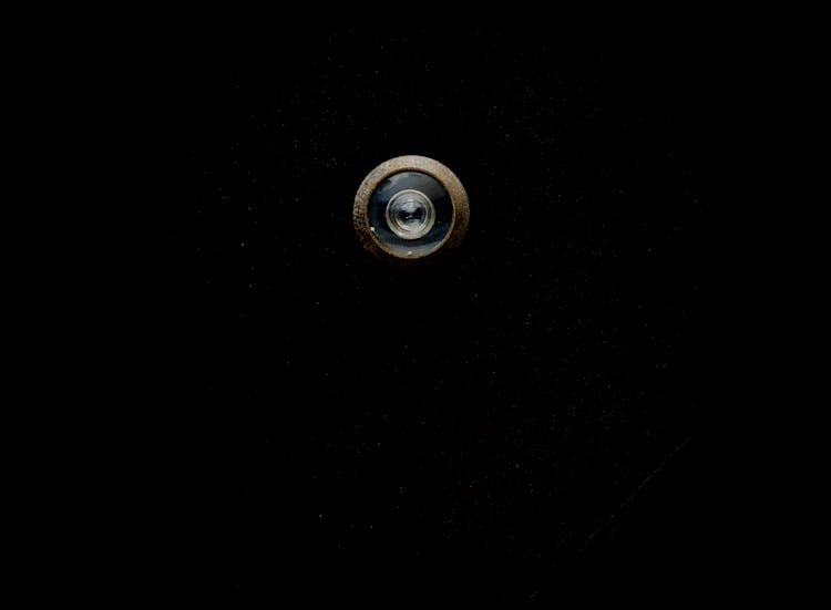 Peephole On Black Door