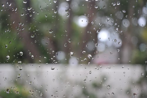 Free Water Droplets on Glass Window Stock Photo