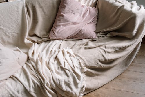 Free Sofa Covered with a Blanket Stock Photo