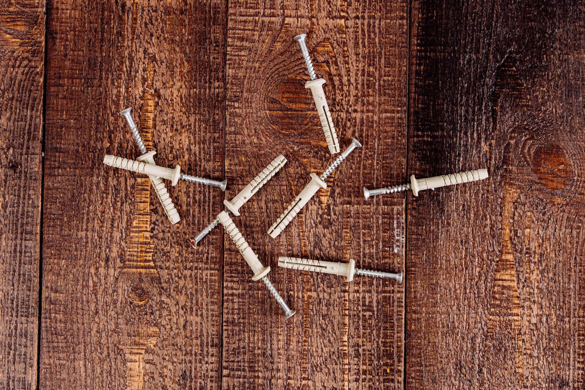 Close-up view of wood planks and screws, ideal for DIY or construction themes.