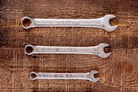 Metal Tools on Wooden Table