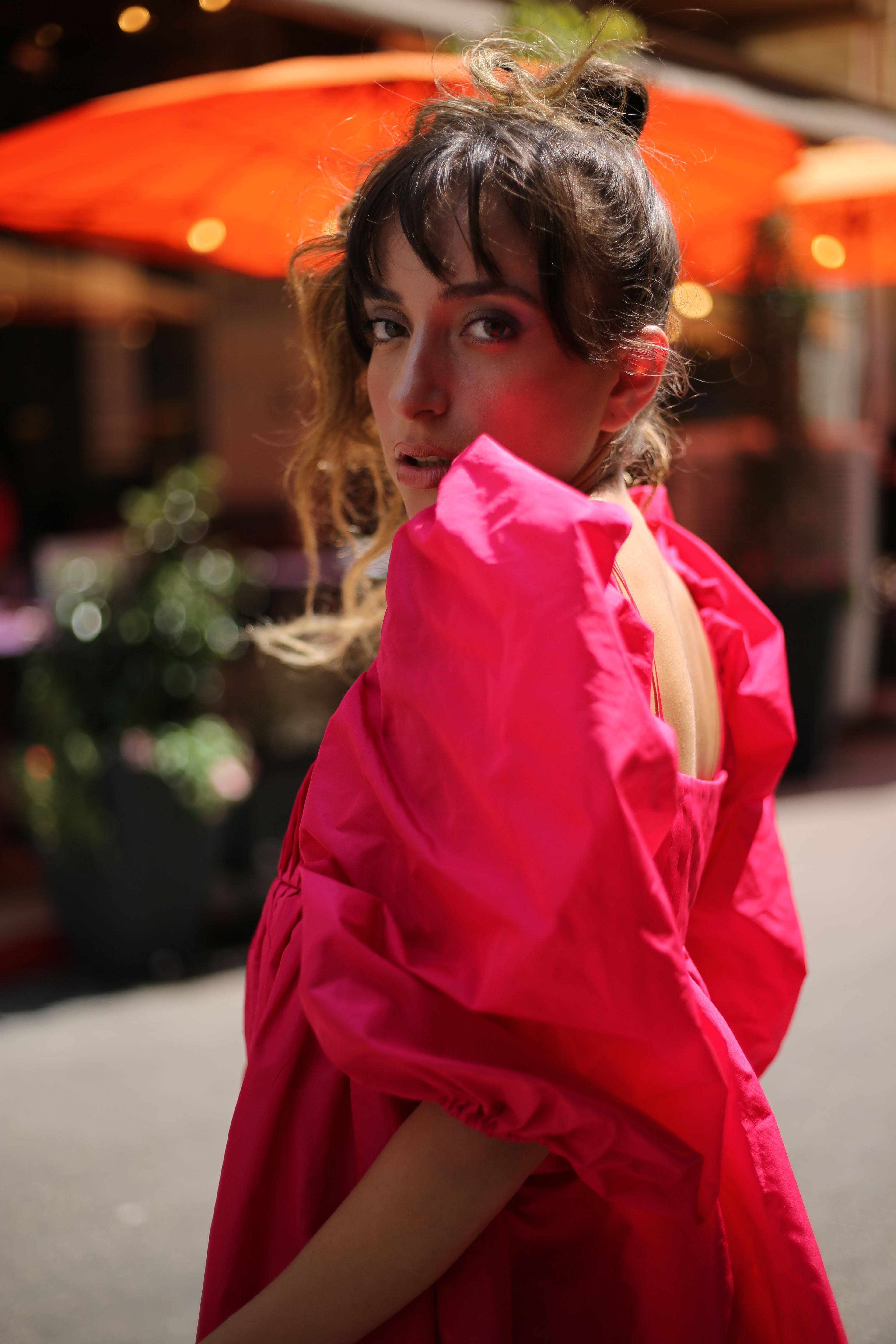 Portrait of a Woman in a Pink Dress · Free Stock Photo