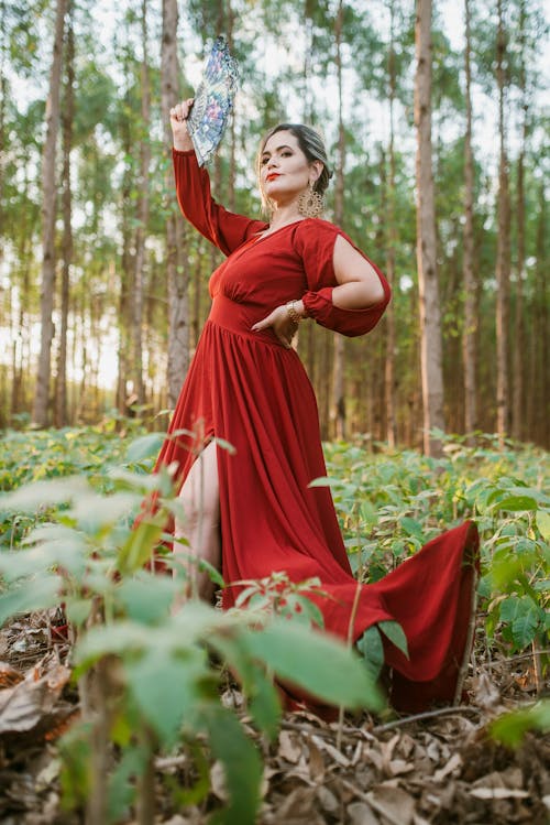 Woman in Red Dress with Hand Fan