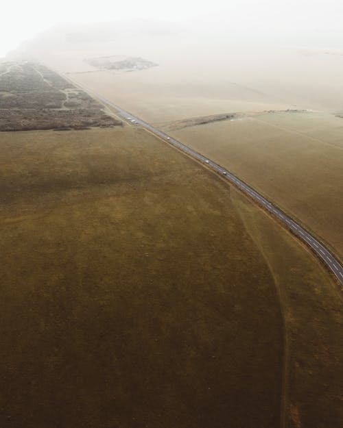 Asphalt roadway in foggy weather
