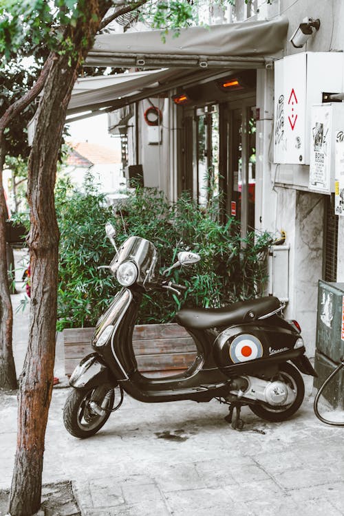 Moped Parked on a Street