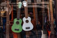 Brown and White Acoustic Guitars
