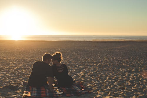 Man and Woman in Front of Horizon