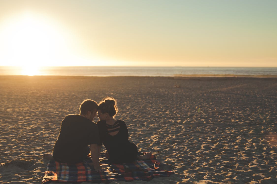 Free Man and Woman in Front of Horizon Stock Photo