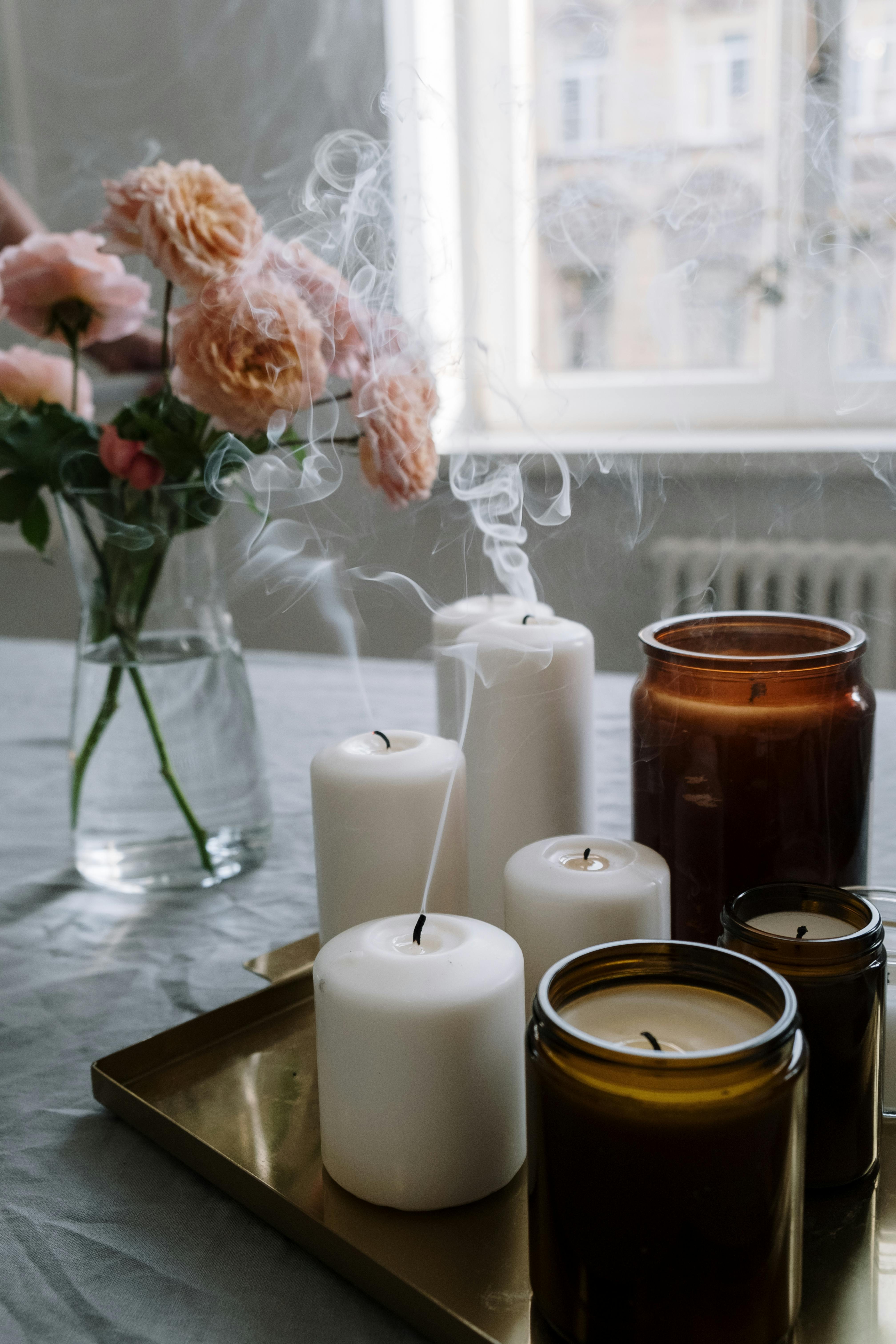 White Pillar Candles on Clear Glass Vase · Free Stock Photo