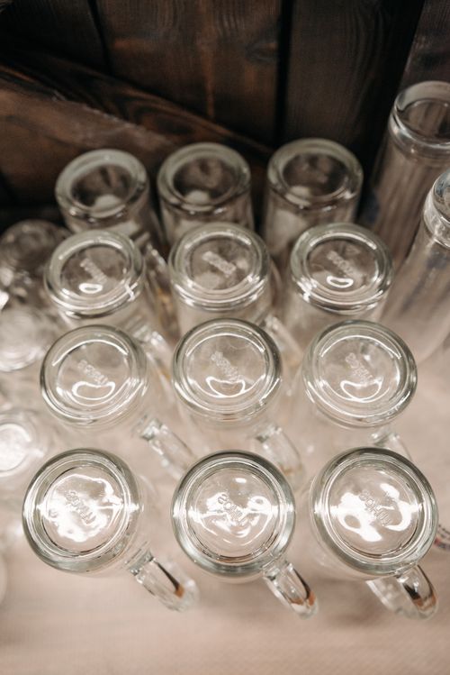 Free Top down view of multiple empty beer glasses upside down, arranged neatly. Stock Photo