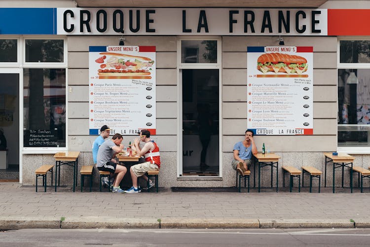 Sandwich Bar With Tables On Street