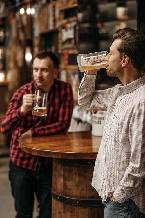 Free Men Drinking Beer Stock Photo