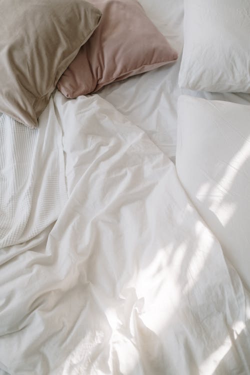 White Bed Linen on the Bed